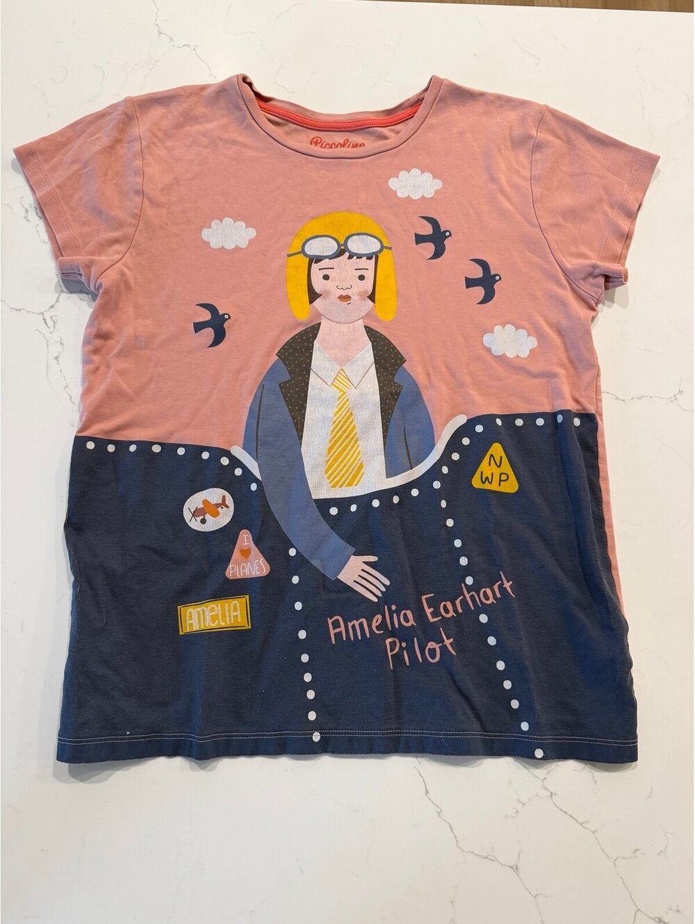 Piccolina Trailblazer Amelia Earhart Pilot Graphic Tee Dusty Pink Women’s M